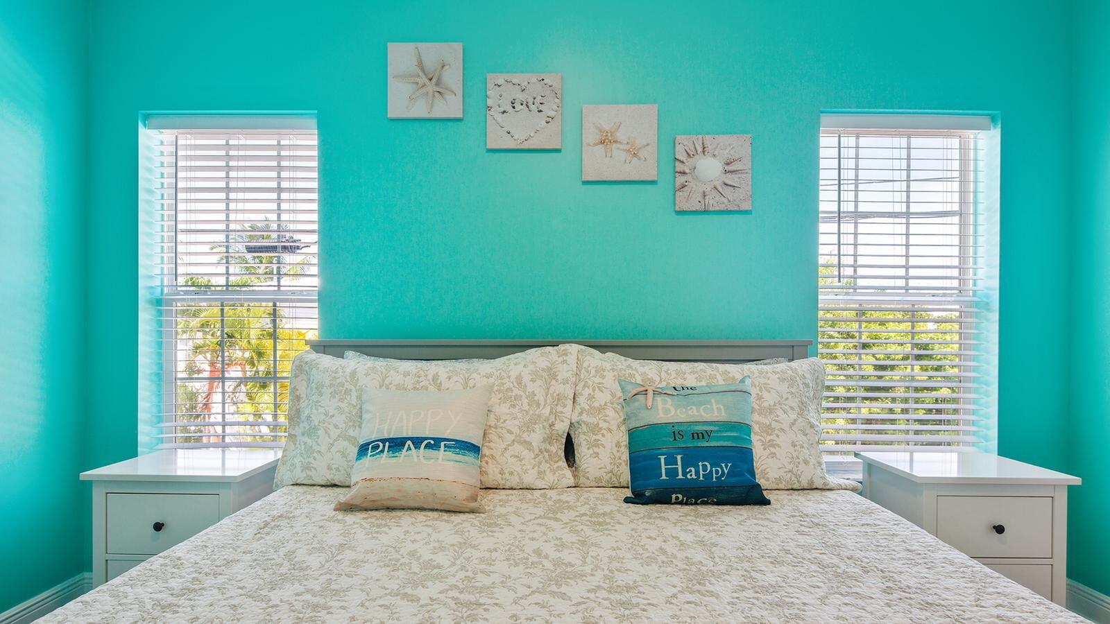 32 Beach Drive Key West, FL 33040 - Photo 12 of 33 a bedroom with furniture and a window