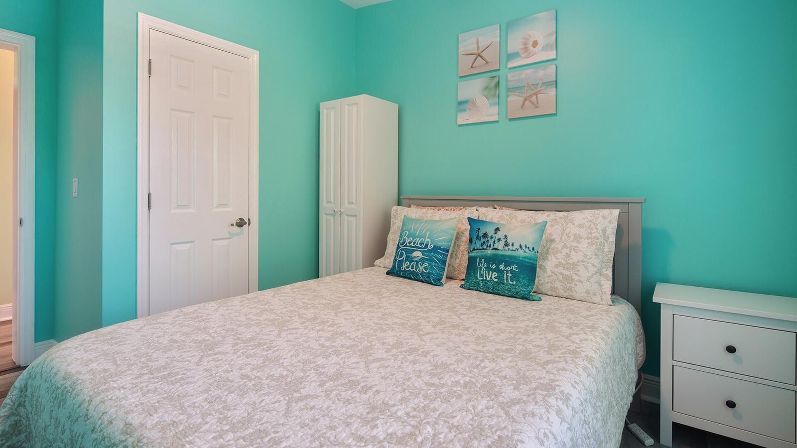 32 Beach Drive Key West, FL 33040 - Photo 15 of 33 a bedroom with a bed and a painting on the wall