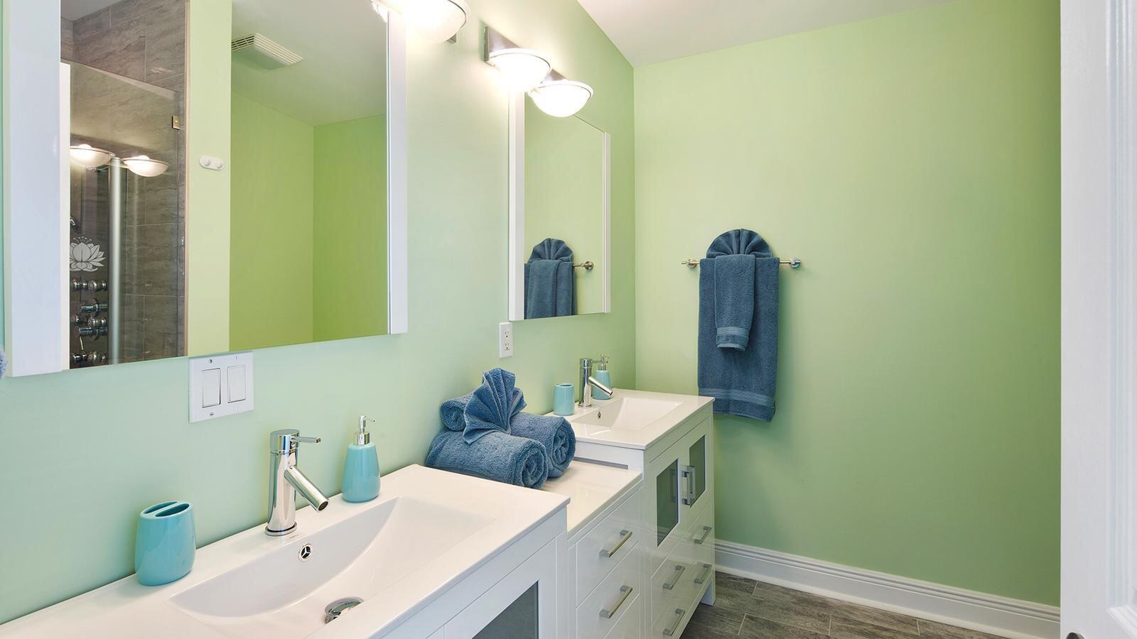 32 Beach Drive Key West, FL 33040 - Photo 16 of 33 a bathroom with a sink and a mirror