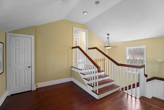 a view of entryway with wooden floor
