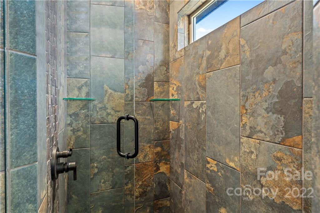 5 Feather Ridge Drive Asheville, NC 28805 - Photo 20 of 32 a bathroom with a shower
