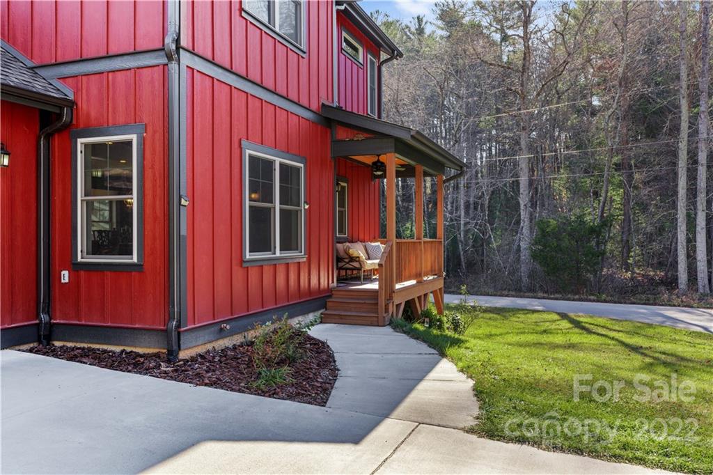 5 Feather Ridge Drive Asheville, NC 28805 - Photo 3 of 32 a view of a house with backyard and sitting area