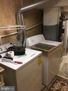 82 3rd Avenue Broomall, PA 19008 - Photo 15 of 17 a utility room with dryer and washer