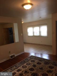 82 3rd Avenue Broomall, PA 19008 - Photo 6 of 17 a view of an empty room and window