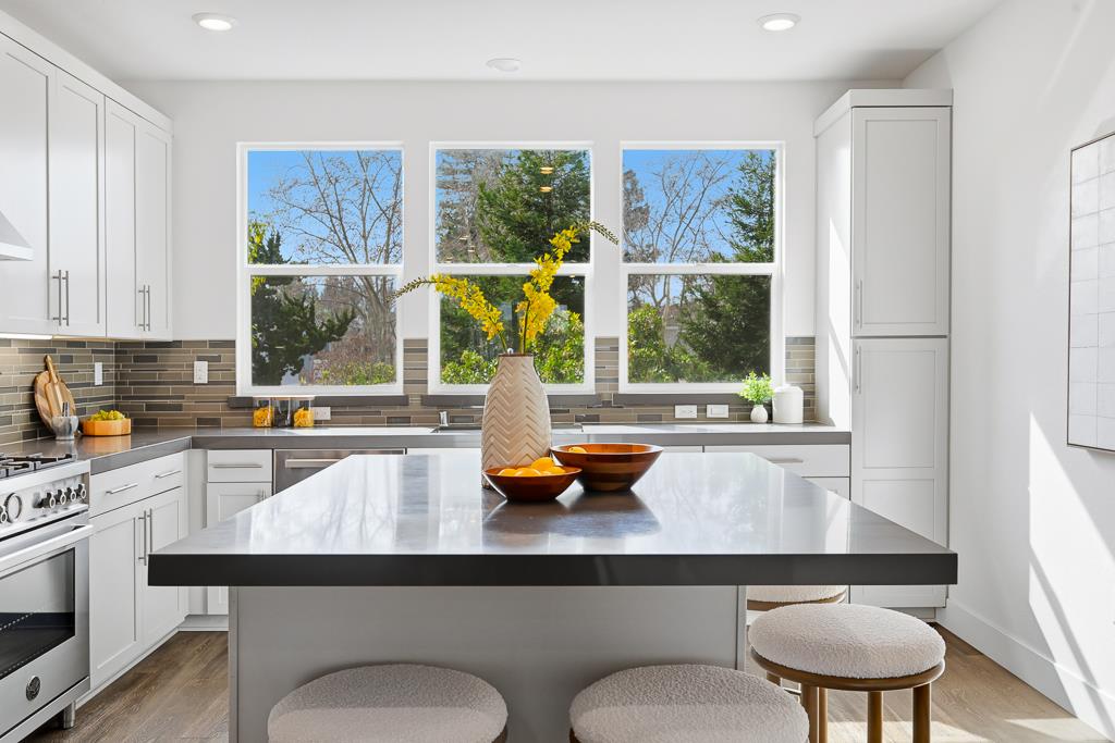 2287 Mora Place Mountain View, CA 94040 - Photo 13 of 64 a kitchen with a window a counter space and dining table
