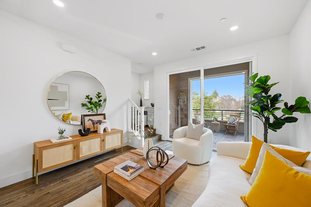 2287 Mora Place Mountain View, CA 94040 - Photo 2 of 64 a living room with furniture flowerpot and wooden floor