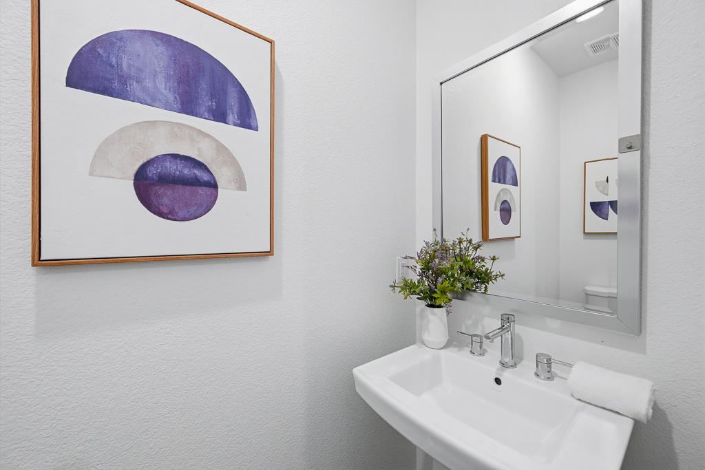 2287 Mora Place Mountain View, CA 94040 - Photo 40 of 64 a bathroom with a sink and a mirror
