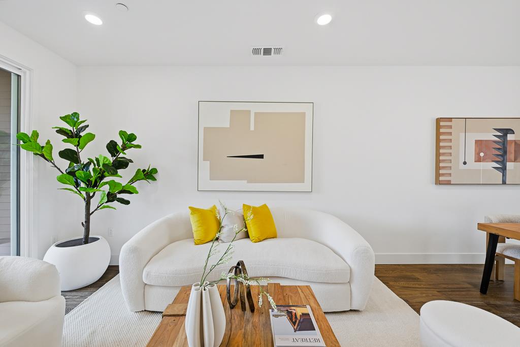 2287 Mora Place Mountain View, CA 94040 - Photo 4 of 64 a living room with furniture flowerpot and wooden floor