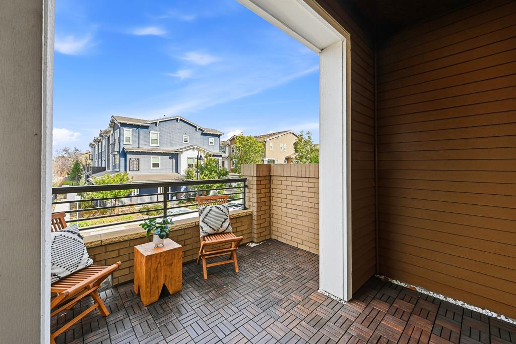 2287 Mora Place Mountain View, CA 94040 - Photo 47 of 64 a view of a balcony with chairs and with wooden fence