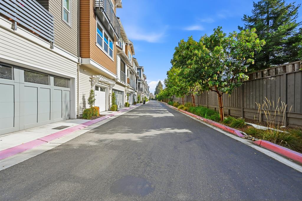 2287 Mora Place Mountain View, CA 94040 - Photo 51 of 64 a view of a street with brick building in the background