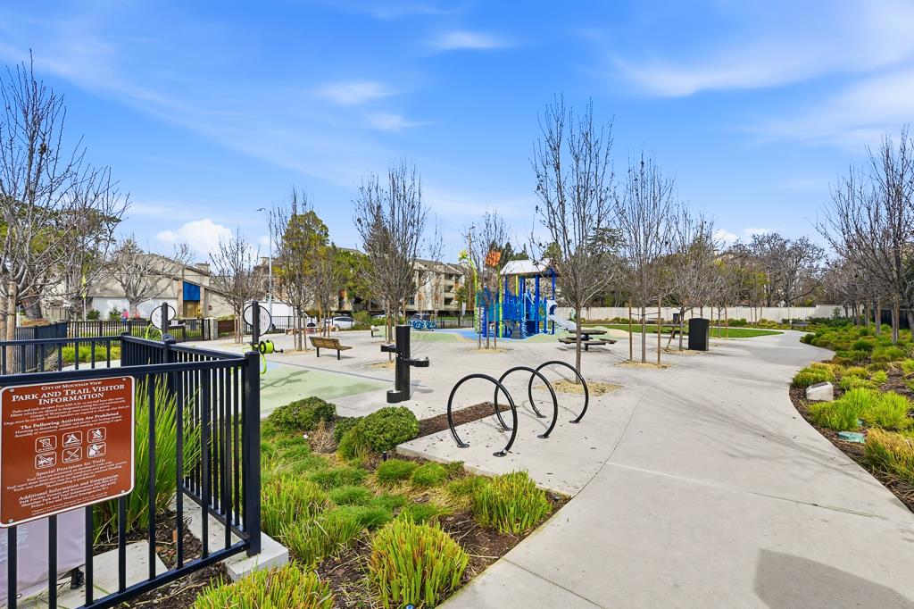 2287 Mora Place Mountain View, CA 94040 - Photo 53 of 64 a view of multiple houses with a yard and lake view