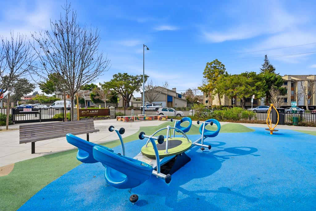 2287 Mora Place Mountain View, CA 94040 - Photo 56 of 64 a swimming pool with outdoor seating and yard