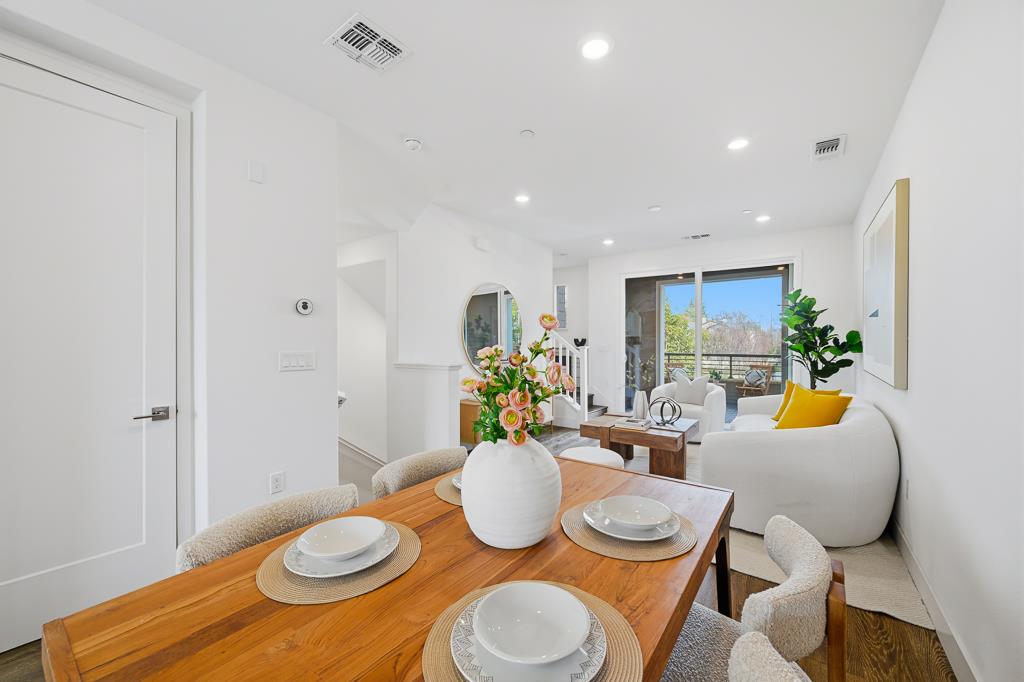 2287 Mora Place Mountain View, CA 94040 - Photo 7 of 64 a dining room with furniture and wooden floor