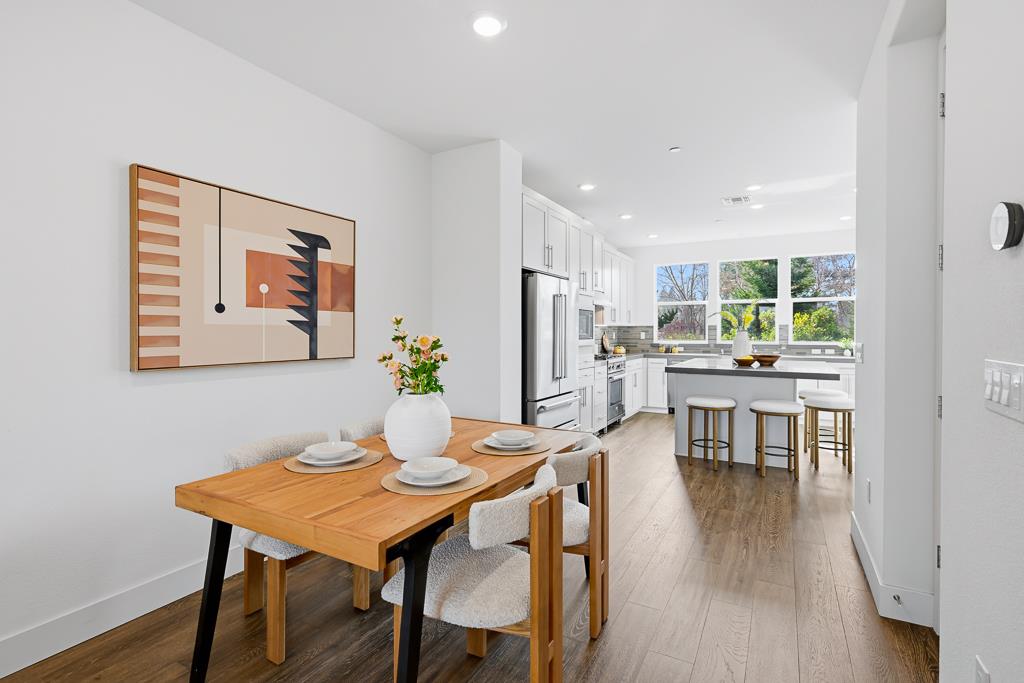 2287 Mora Place Mountain View, CA 94040 - Photo 10 of 64 a view of a dining room with furniture and wooden floor