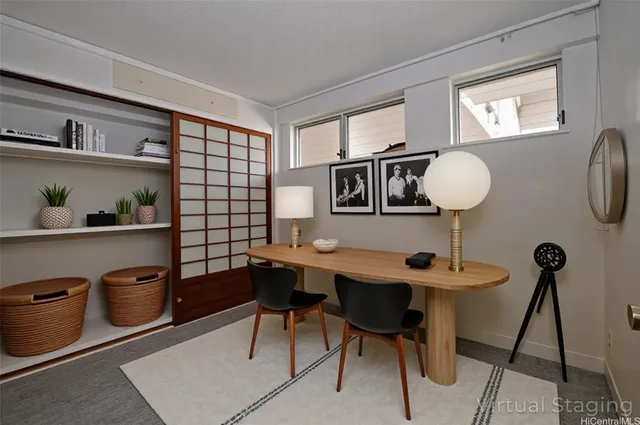 a view of a workspace with furniture