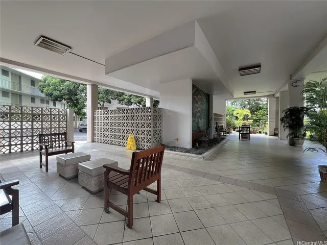 a view of a patio with garden