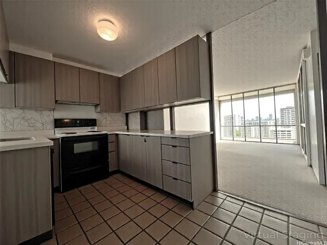 a kitchen with a cabinets and white appliances