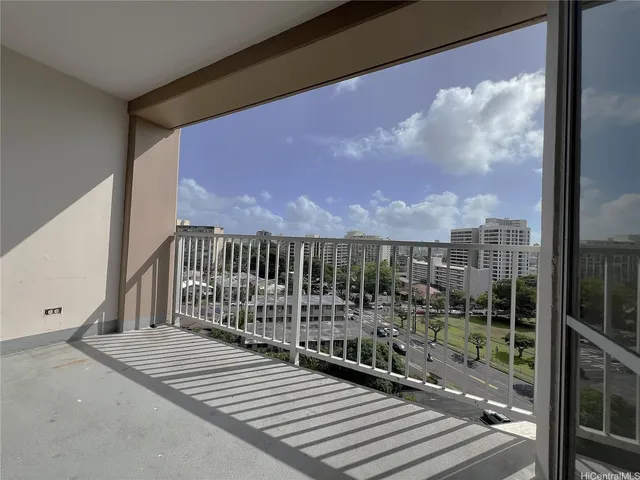 a view of a balcony with city view