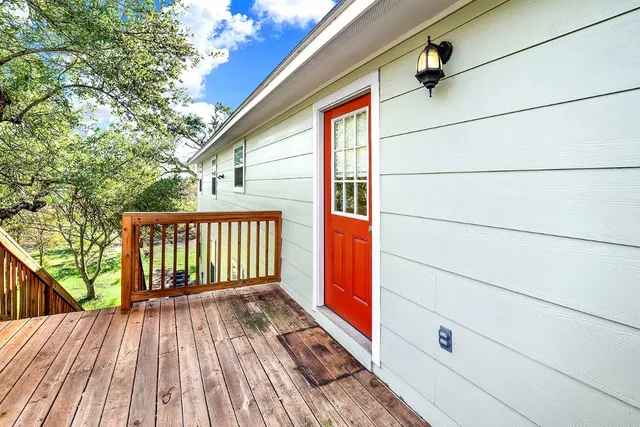 a view of outdoor space with deck and wooden floor