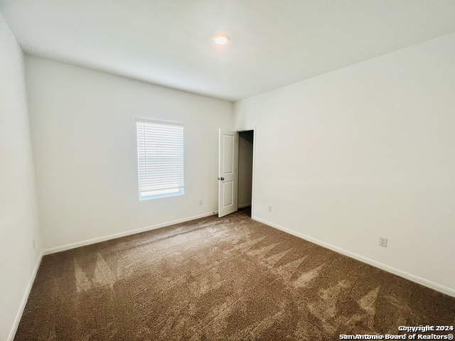32141 Morels Avenue Bulverde, TX 78163 - Photo 14 of 22 an empty room with a natural light