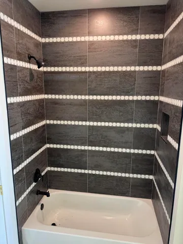 a bathroom with a bathtub