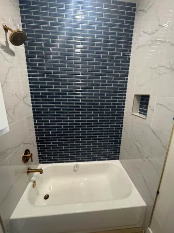 a bathroom with a bathtub