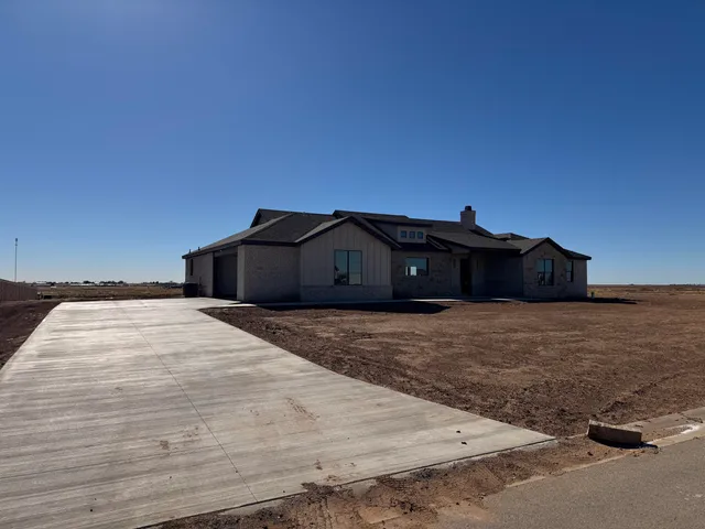 a bedroom with a bed and a bathroom