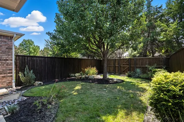 a view of garden with patio