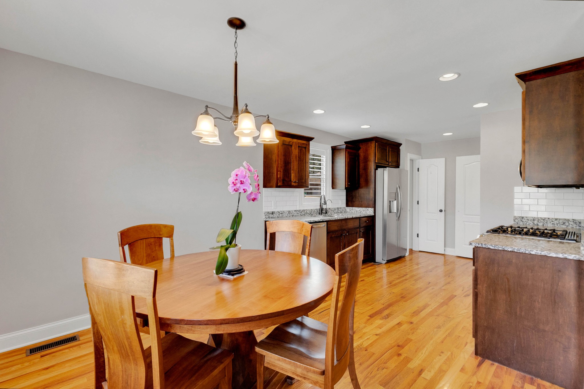509 Gunn Lane Springfield, TN 37172 - Photo 12 of 48 a view of a dining room with furniture and wooden floor