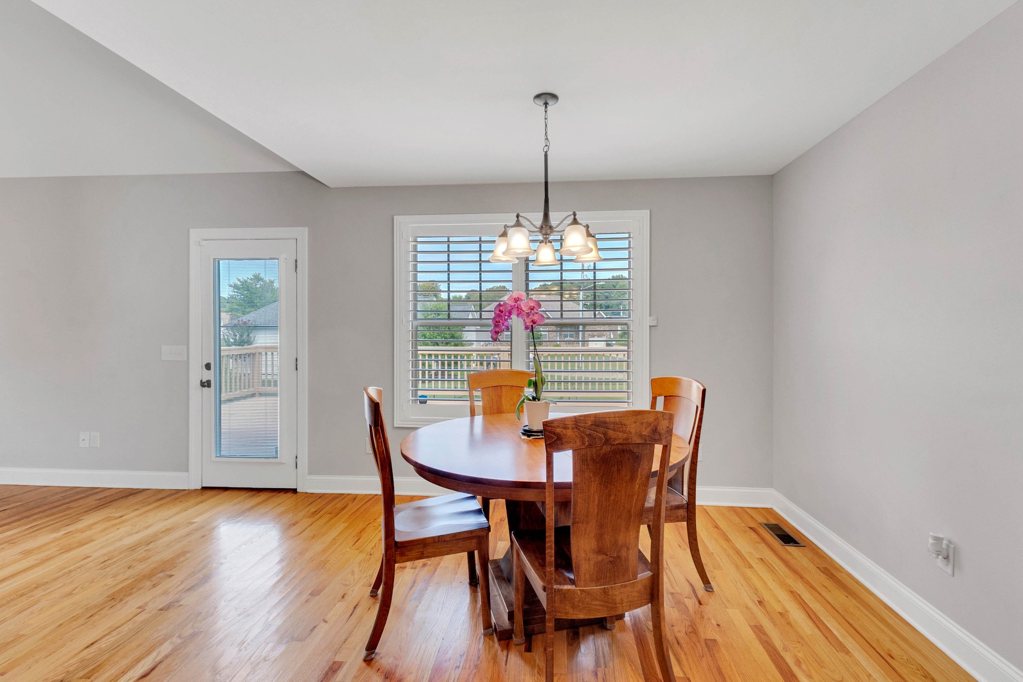 509 Gunn Lane Springfield, TN 37172 - Photo 15 of 48 a view of a dining room with furniture wooden floor and chandelier
