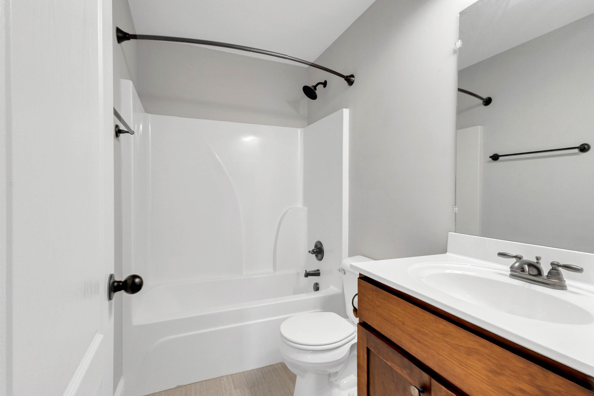 509 Gunn Lane Springfield, TN 37172 - Photo 27 of 48 a bathroom with a granite countertop sink a toilet and shower