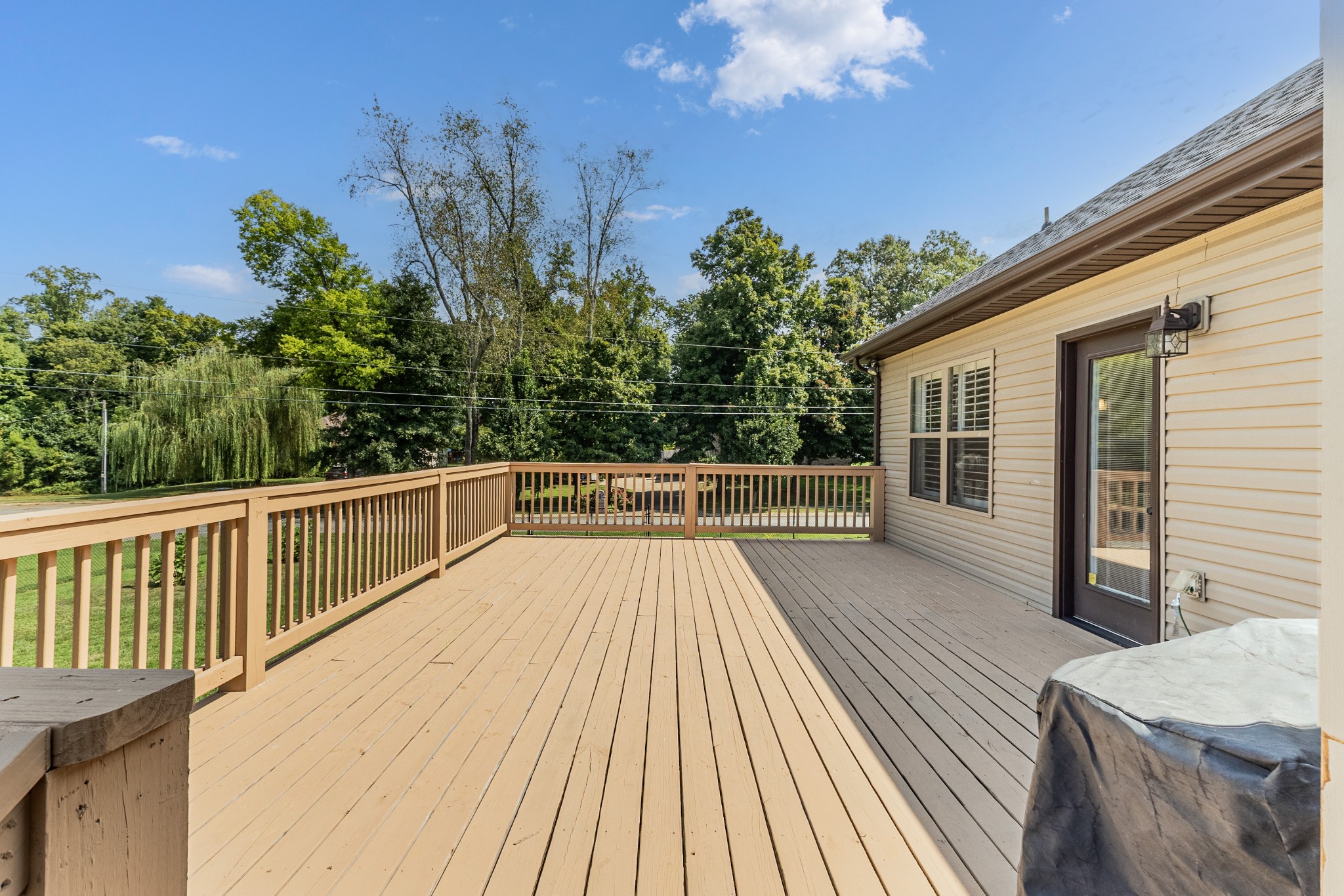 509 Gunn Lane Springfield, TN 37172 - Photo 41 of 48 a view of balcony with wooden floor and seating space
