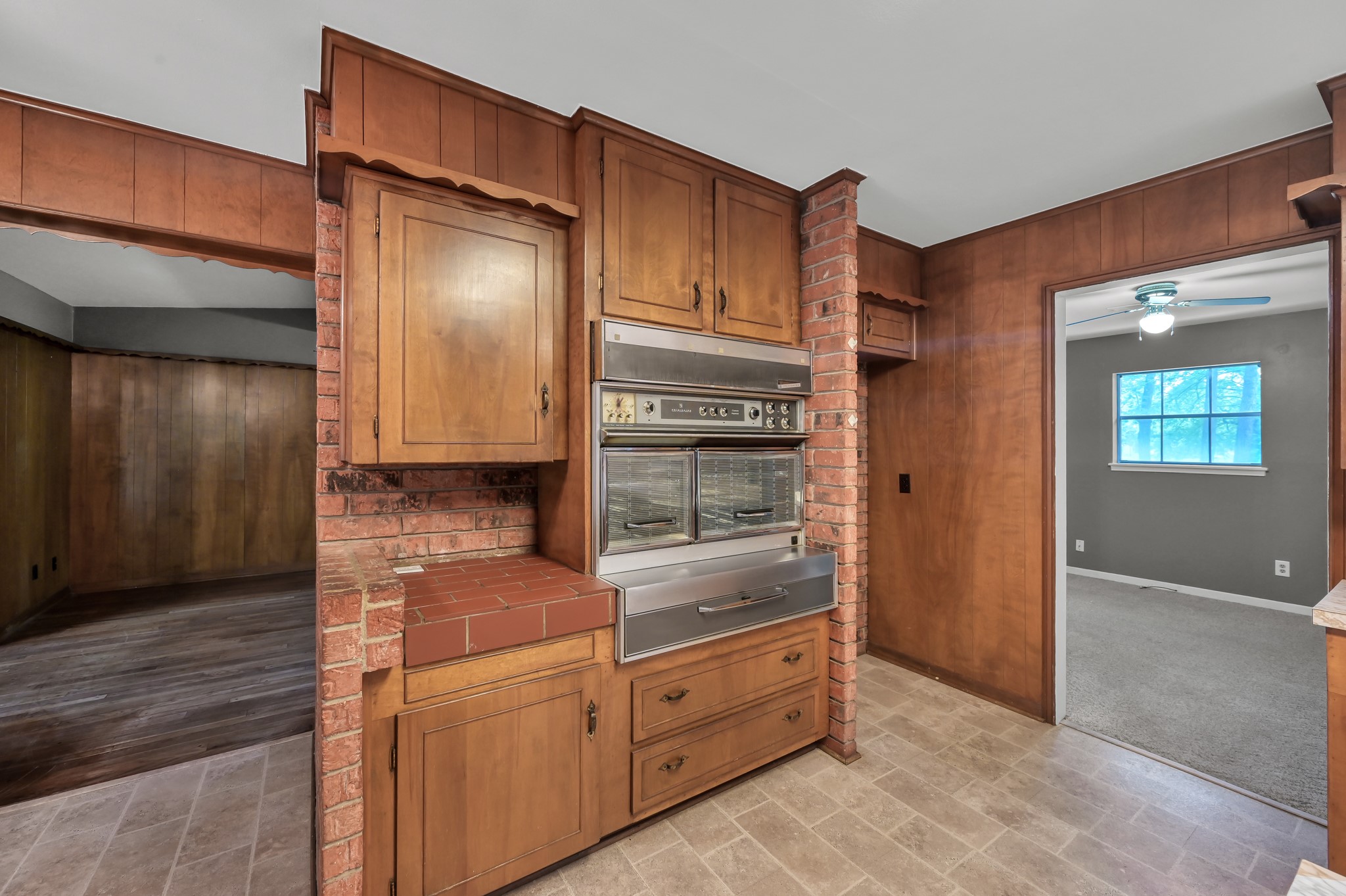 1251 Pruitt Road The Woodlands, TX 77380 - Photo 15 of 36 View of kitchen into dining/den with vintage appliance package