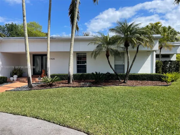 a front view of house with yard