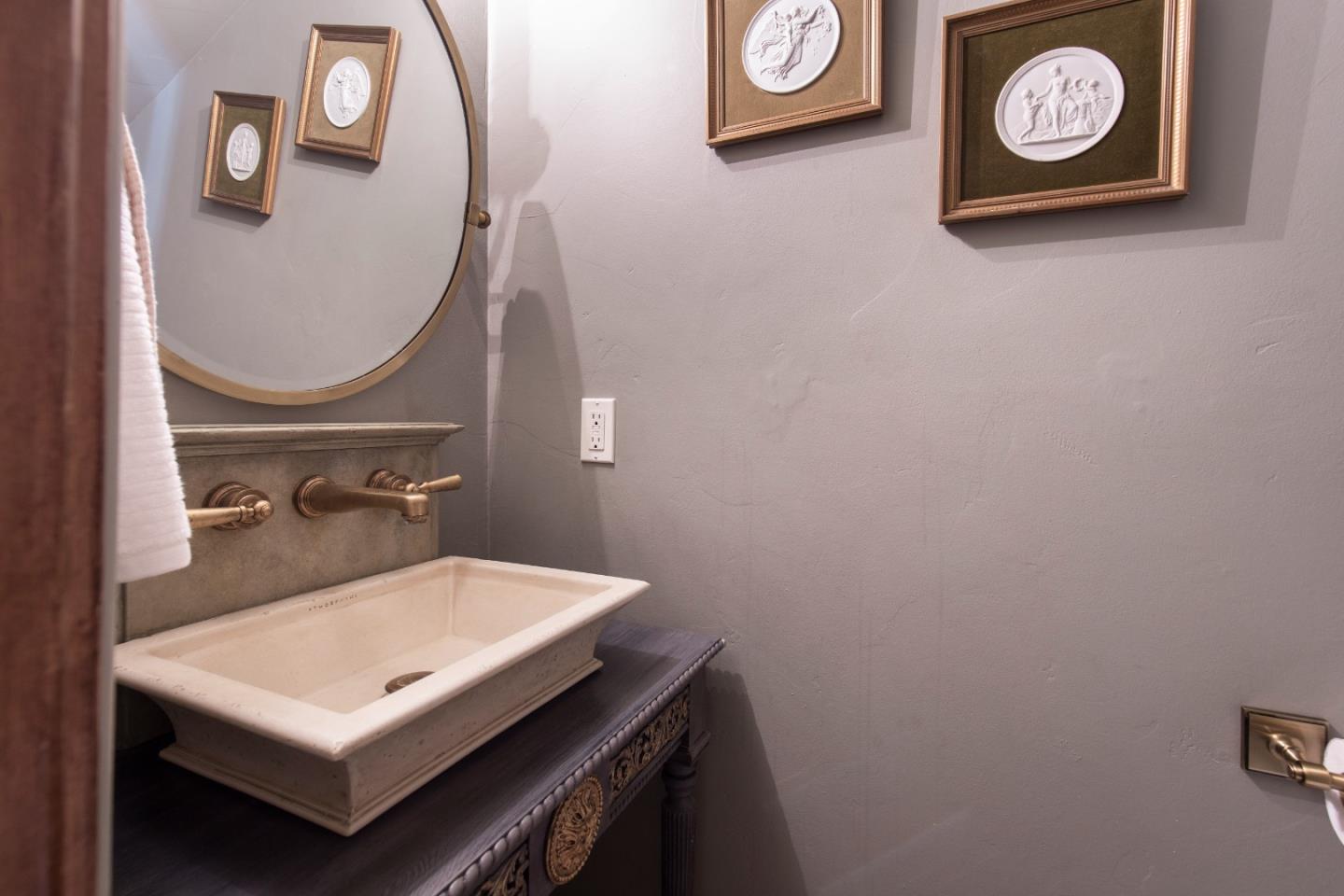 0 Southwest Sw Corner Carmel, CA 93923 - Photo 12 of 30 a bathroom with a sink and a mirror