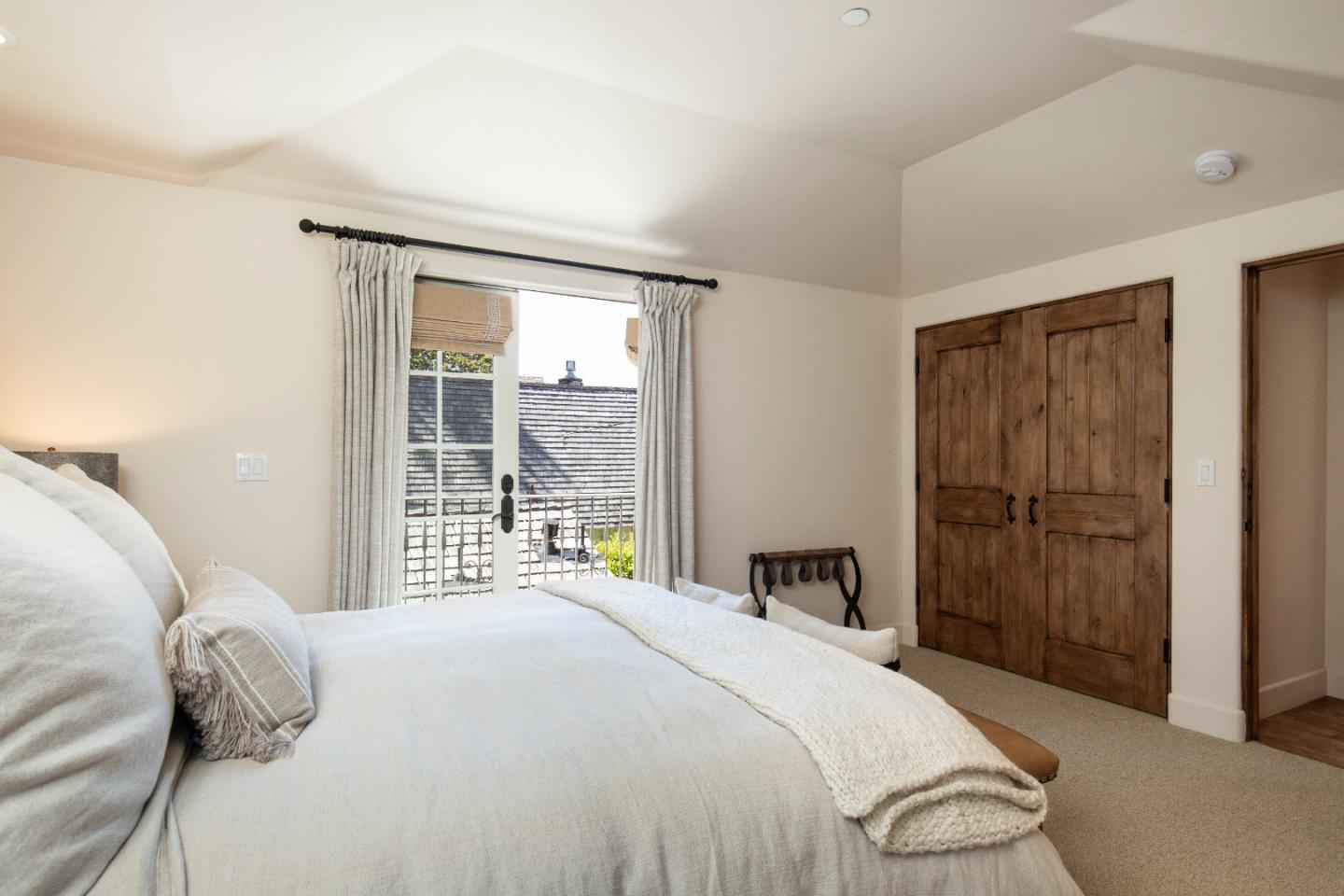 0 Southwest Sw Corner Carmel, CA 93923 - Photo 20 of 30 a bedroom with a bed and a window