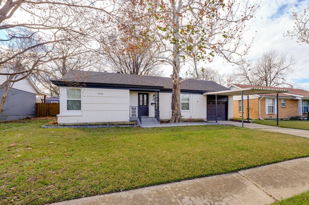 2824 Lockhart Avenue Dallas, TX 75228 - Photo 2 of 16 a front view of a house with garden