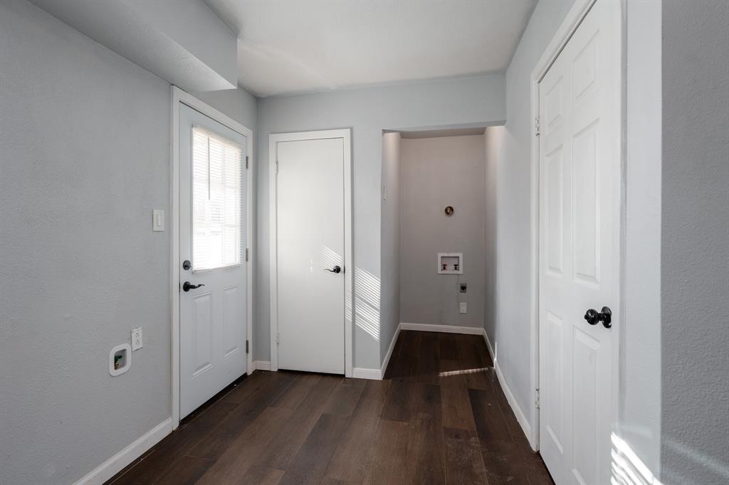 2824 Lockhart Avenue Dallas, TX 75228 - Photo 9 of 16 a view of a hallway with wooden floor and closet area