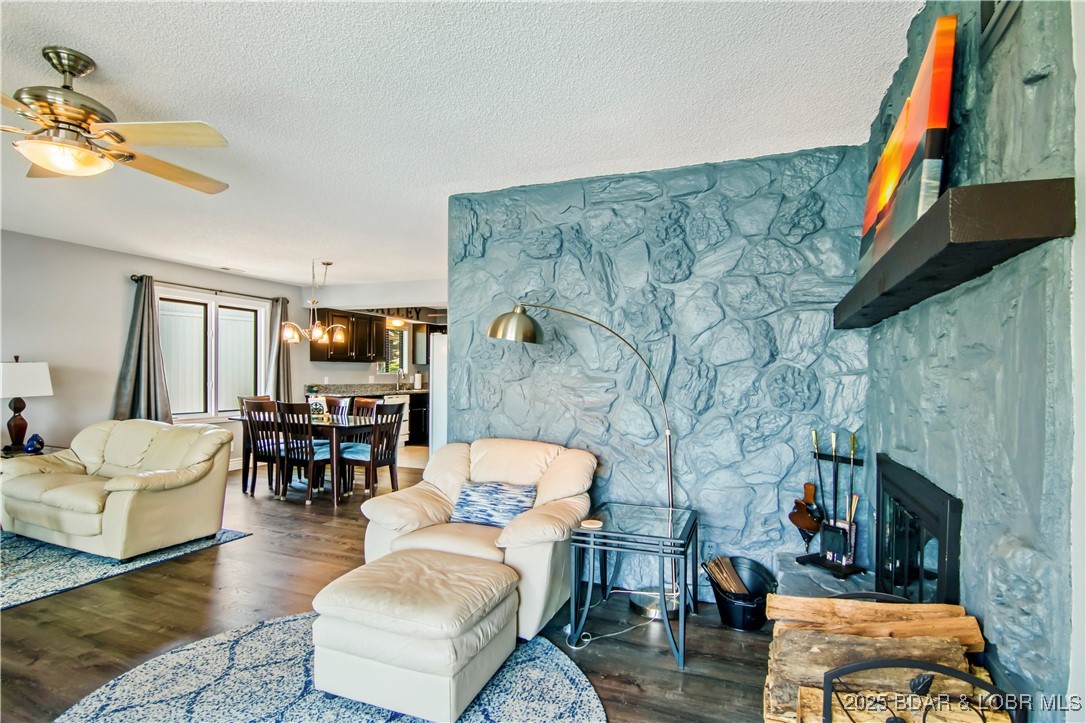 889 Malibu Road, Unit 63 Osage Beach, MO 65065 - Photo 20 of 47 Grab a good book and sit by the cozy fire!