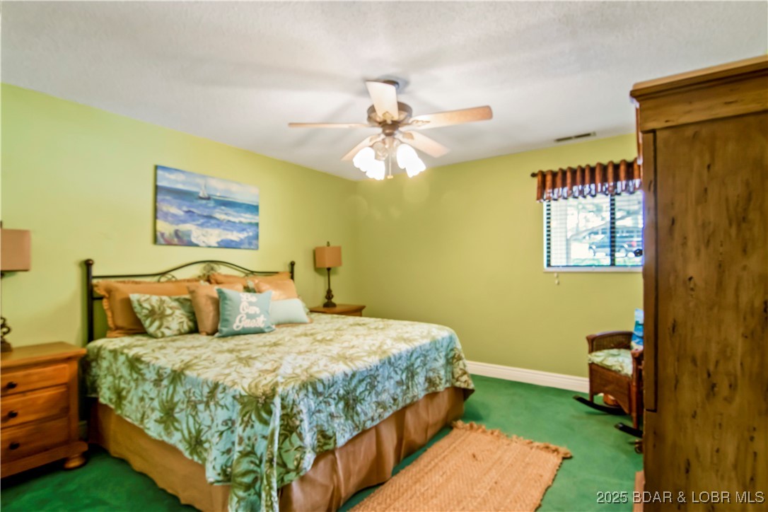 889 Malibu Road, Unit 63 Osage Beach, MO 65065 - Photo 24 of 47 Roadside Guest Bedroom.