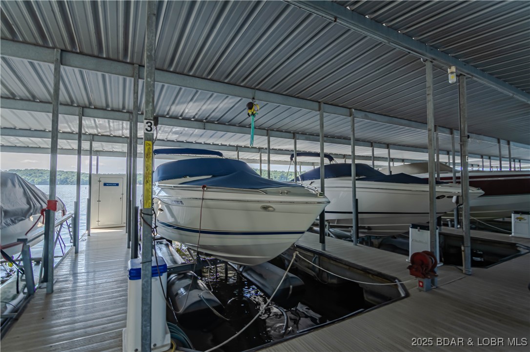 889 Malibu Road, Unit 63 Osage Beach, MO 65065 - Photo 4 of 47 There's an 11x30 slip attached to your unit!