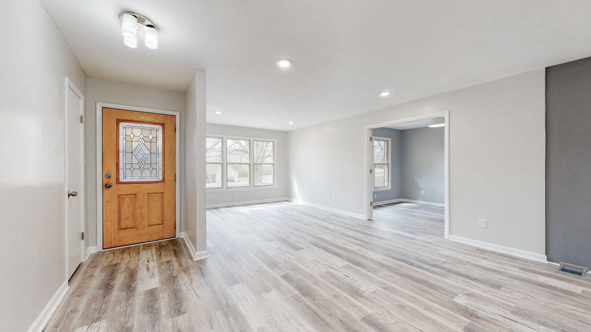 102 East Prospect Road Fayetteville, TN 37334 - Photo 12 of 32 a view of an empty room with wooden floor and a window
