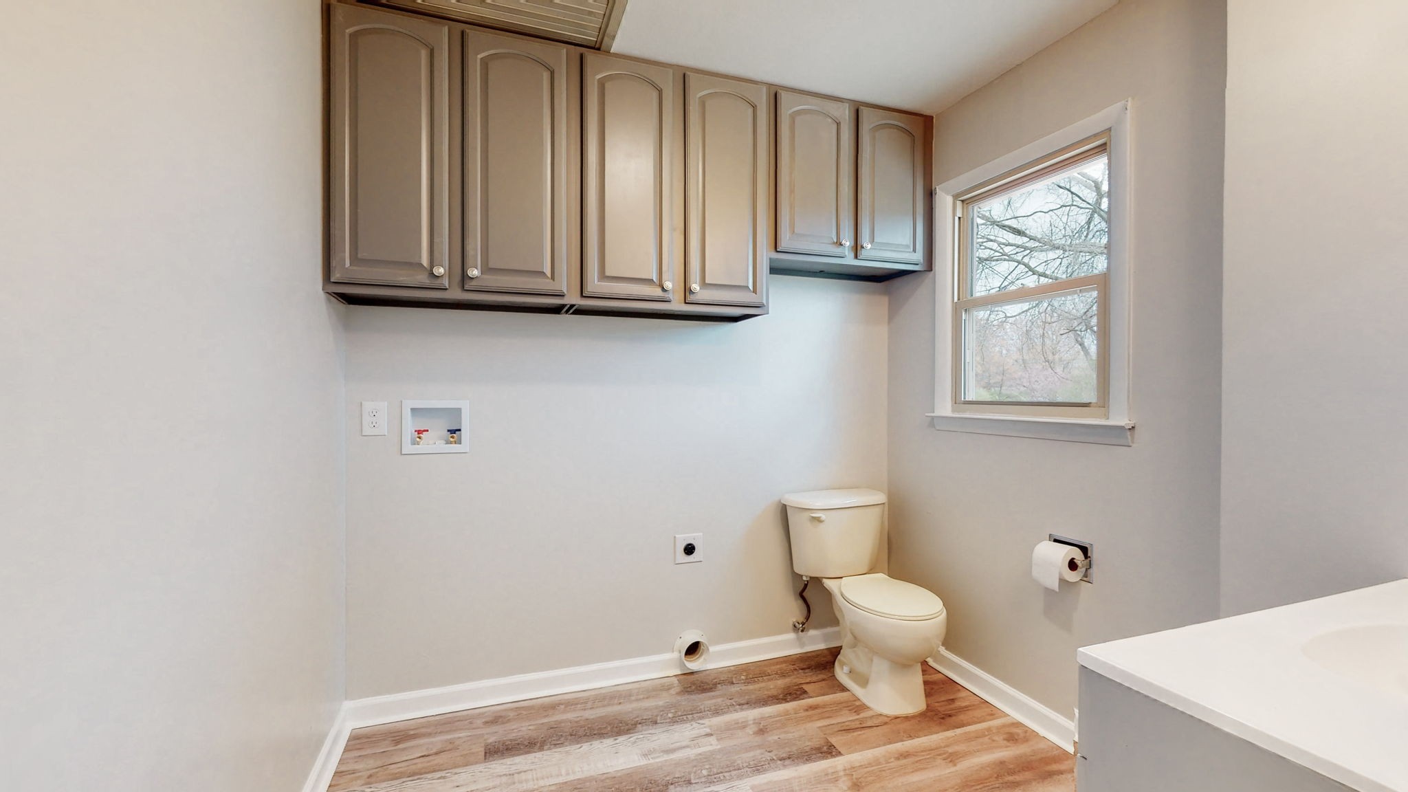 102 East Prospect Road Fayetteville, TN 37334 - Photo 16 of 32 a bathroom with a toilet sink a mirror and vanity