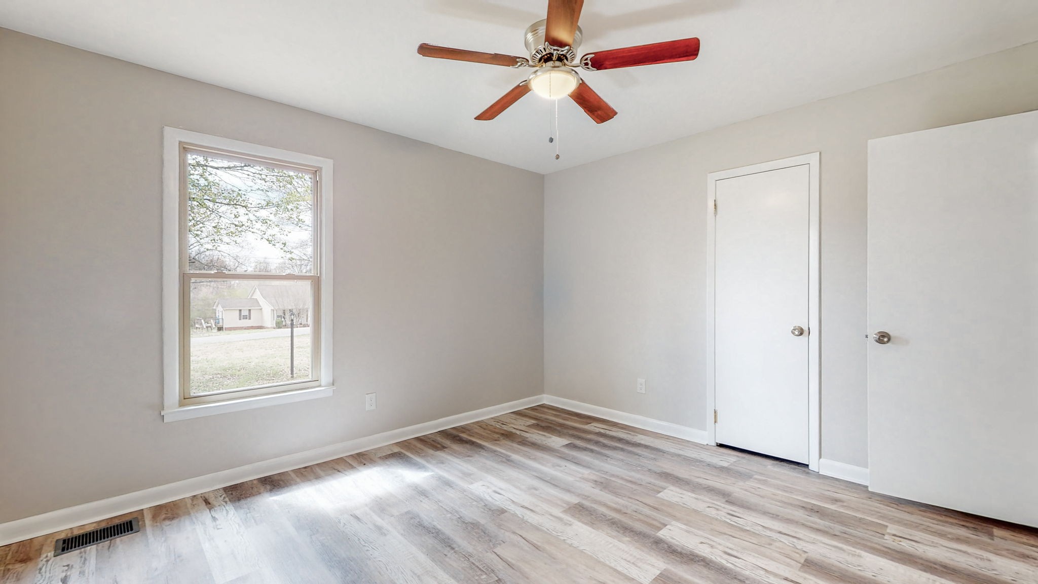 102 East Prospect Road Fayetteville, TN 37334 - Photo 19 of 32 a view of empty room with window and ceiling fan