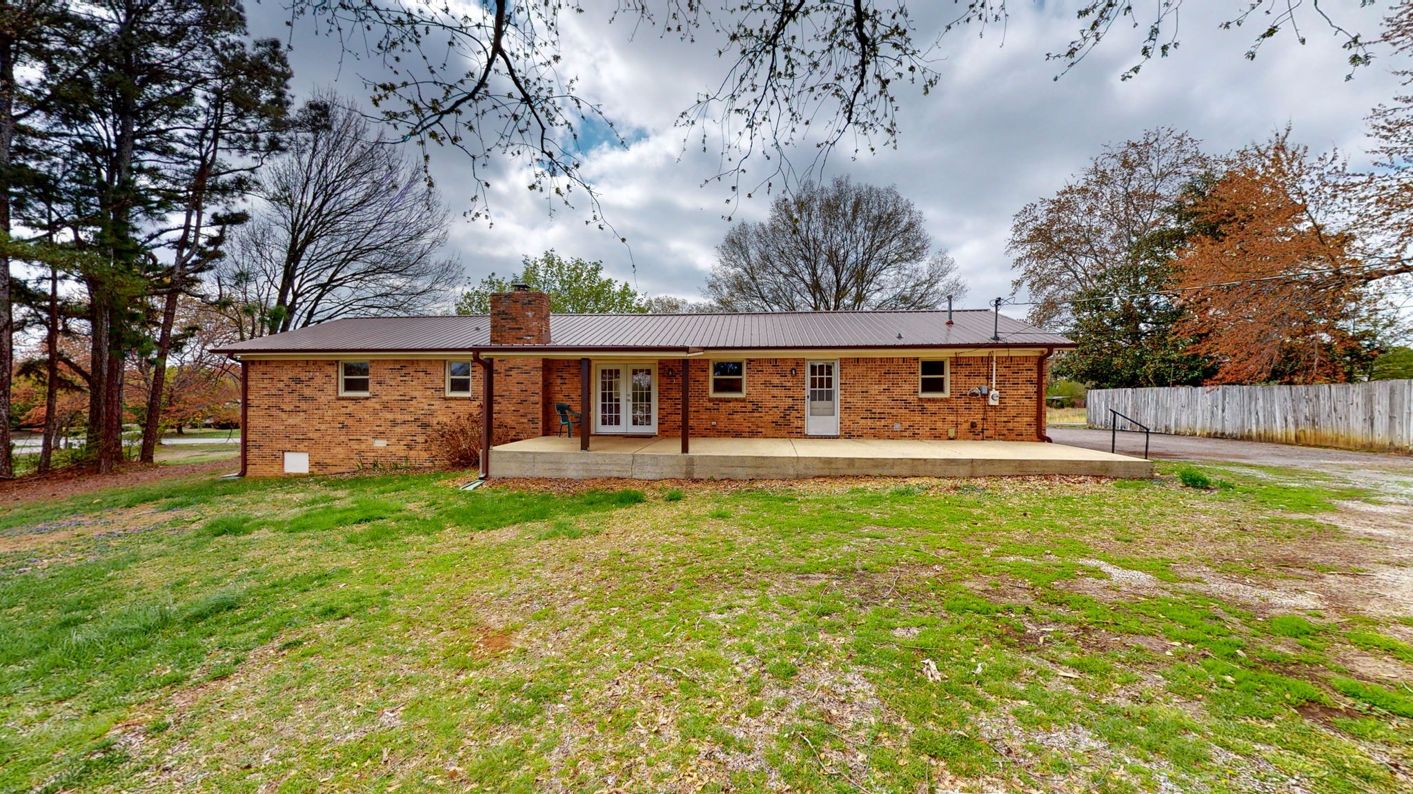 102 East Prospect Road Fayetteville, TN 37334 - Photo 24 of 32 a view of a house with backyard and a tree