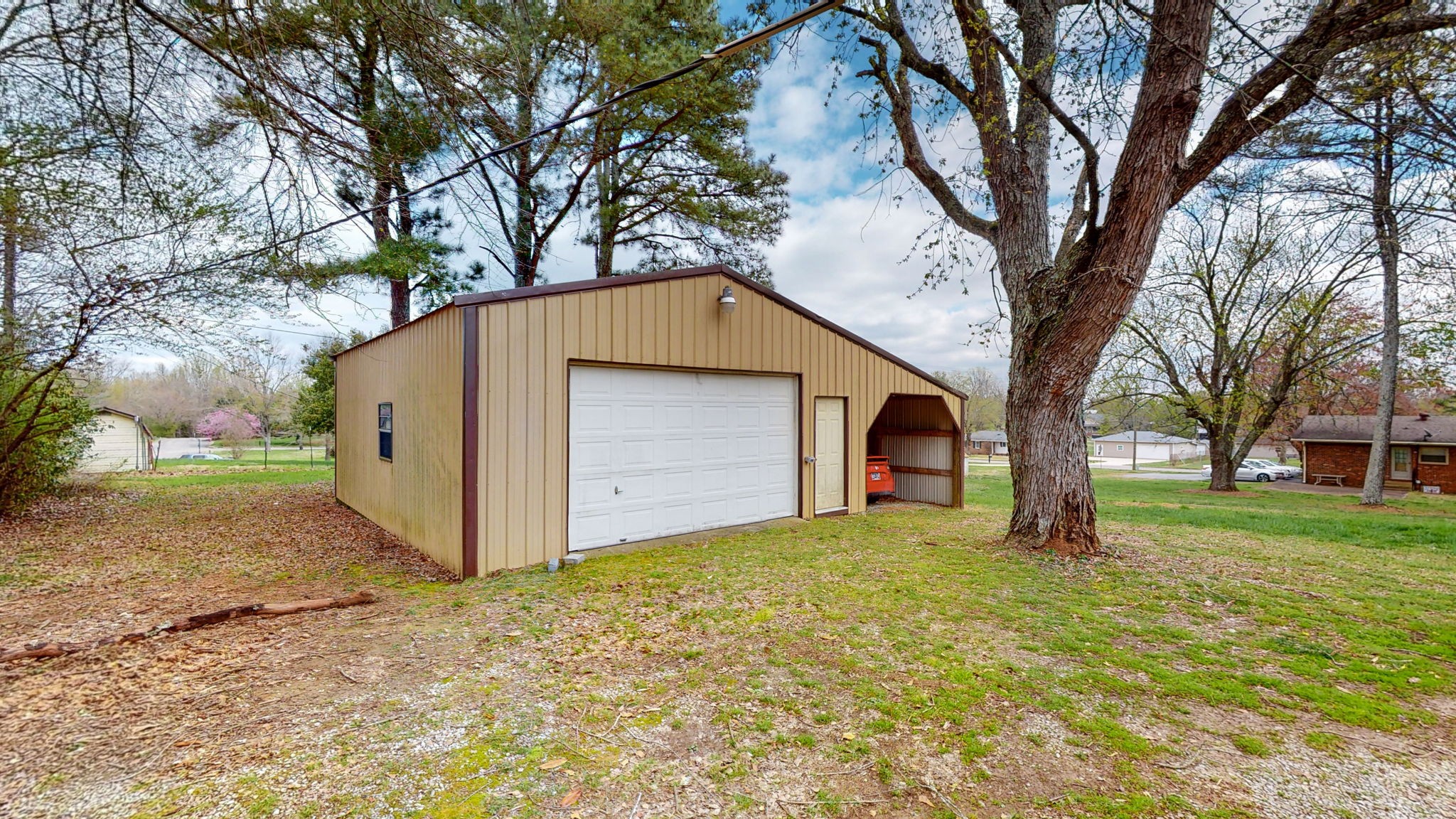102 East Prospect Road Fayetteville, TN 37334 - Photo 27 of 32 a front view of house with yard and trees