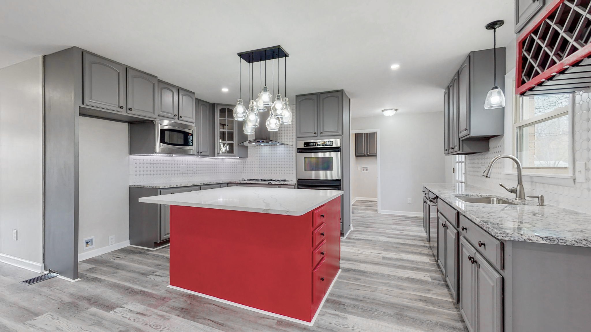 102 East Prospect Road Fayetteville, TN 37334 - Photo 4 of 32 a kitchen with kitchen island stainless steel appliances a sink stove and refrigerator