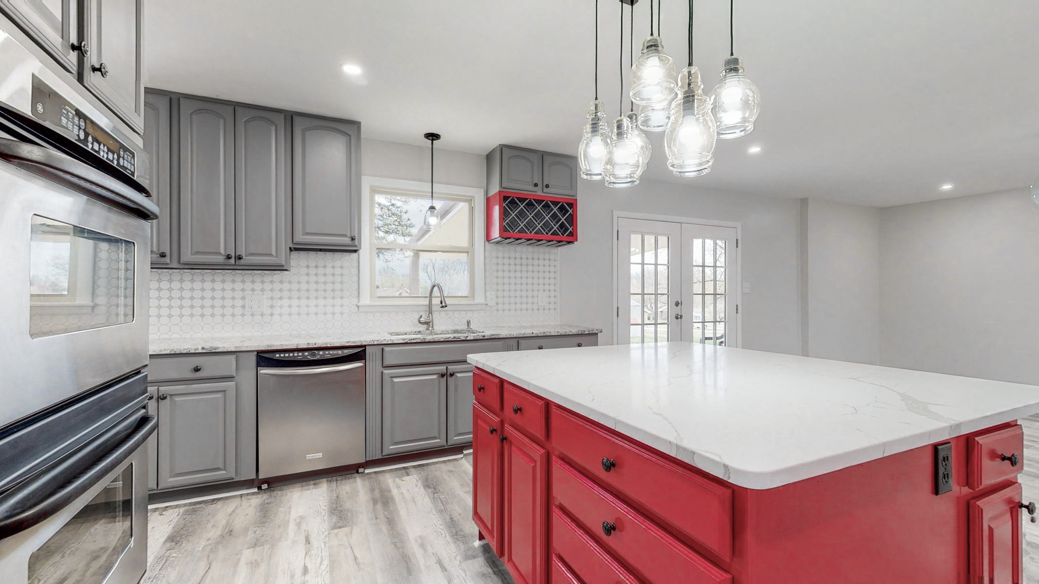 102 East Prospect Road Fayetteville, TN 37334 - Photo 7 of 32 a kitchen with a stove a sink dishwasher a kitchen island with wooden cabinets and floor