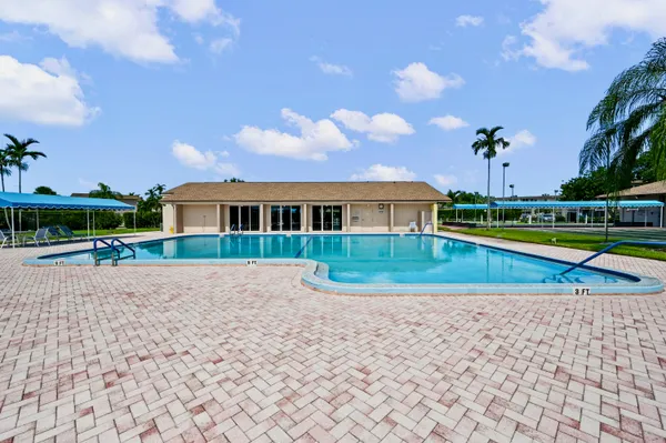 a view of a house with a swimming pool