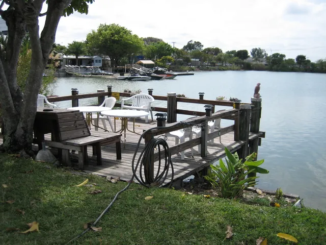 a view of a lake with sitting area